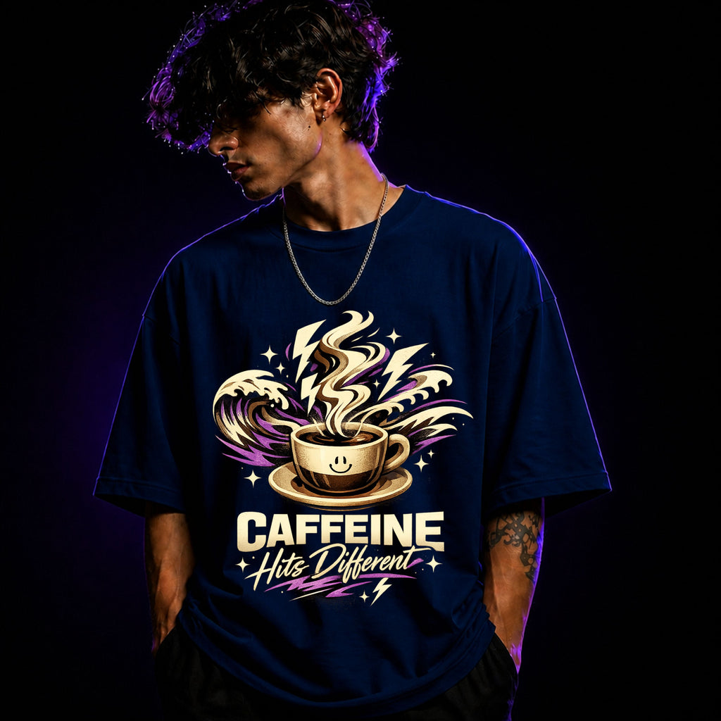 Caffeine Hits Different Oversized Graphic T-Shirt – Coffee Lover Unisex Tee
