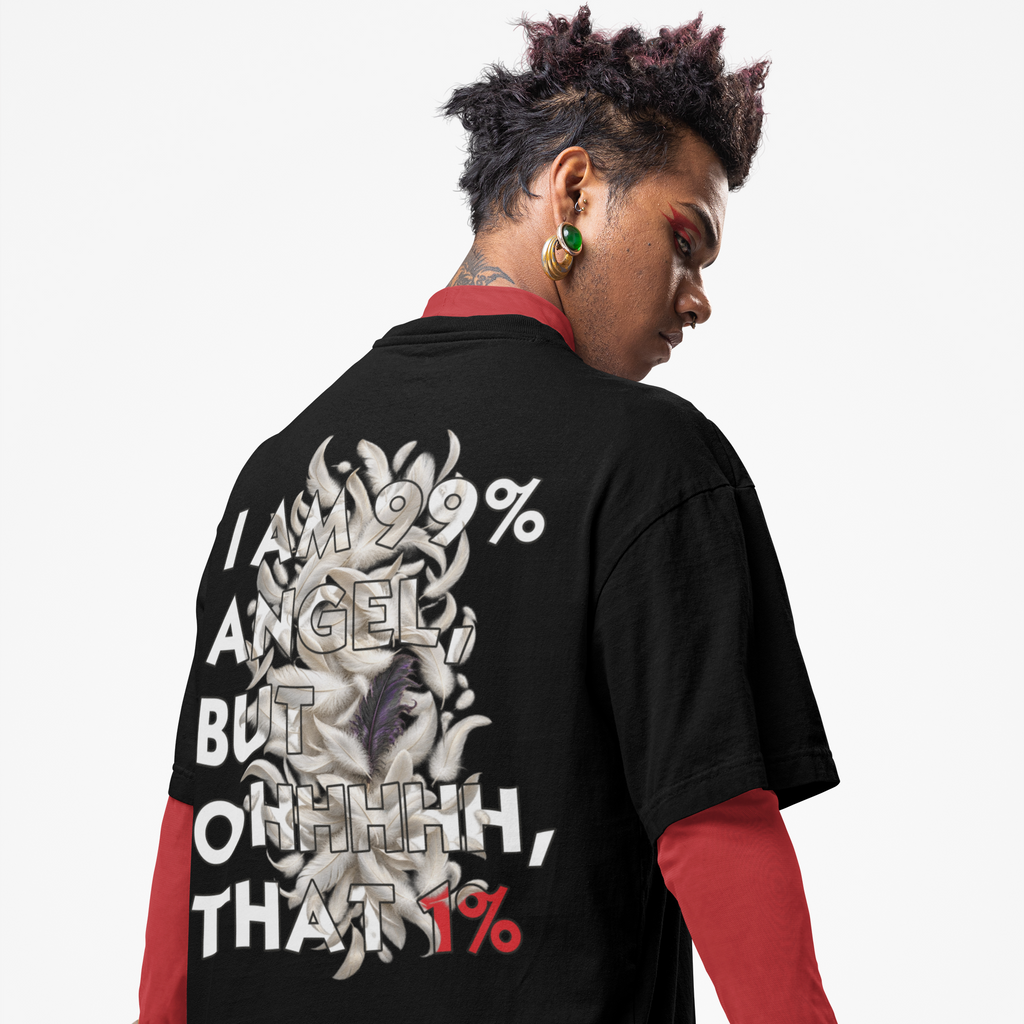 A model shown from the back wearing a black graphic t-shirt with a large white and red text design, layered over a red long-sleeve shirt and red pants, against a plain white background.